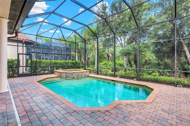 6419 Vivaldi Ct, Naples, FL 34113 - view of pool featuring a patio area, a pool with connected hot tub, and a lanai