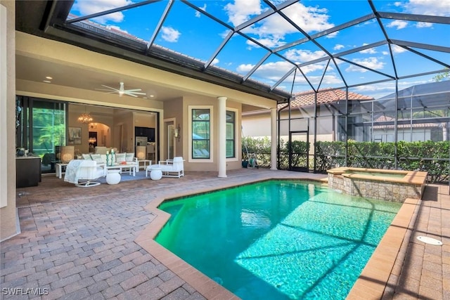 6419 Vivaldi Ct, Naples, FL 34113 - view of swimming pool featuring a patio area, ceiling fan, a pool with connected hot tub, and a lanai