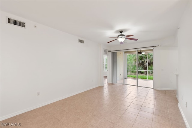 1335 Henley St Unit 802, Naples, FL 34105 - unfurnished room with a ceiling fan, baseboards, and light tile patterned floors