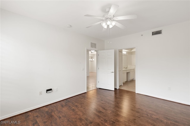 1335 Henley St Unit 802, Naples, FL 34105 - empty room featuring a ceiling fan, wood finished floors, baseboards, and a smoke detector