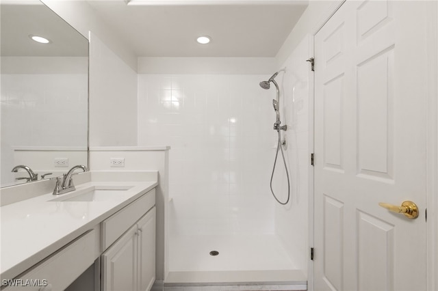 1335 Henley St Unit 802, Naples, FL 34105 - full bathroom featuring vanity, tiled shower, and recessed lighting