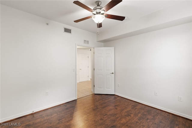 1335 Henley St Unit 802, Naples, FL 34105 - empty room featuring ceiling fan, wood finished floors, and baseboards