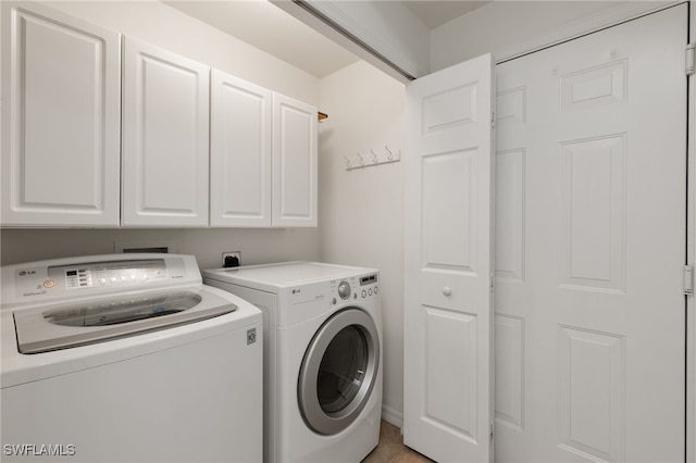 1335 Henley St Unit 802, Naples, FL 34105 - laundry room with cabinet space and washing machine and dryer