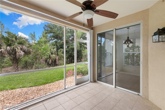 1335 Henley St Unit 802, Naples, FL 34105 - unfurnished sunroom featuring a ceiling fan