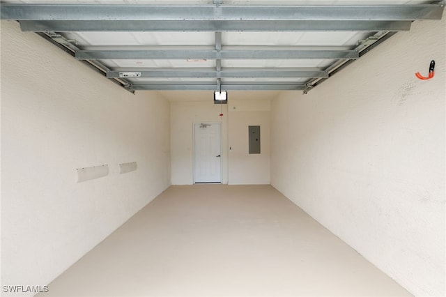 1335 Henley St Unit 802, Naples, FL 34105 - garage featuring electric panel and a garage door opener