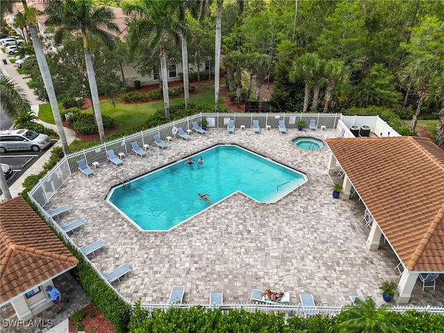 1335 Henley St Unit 802, Naples, FL 34105 - community pool featuring a patio and a community hot tub