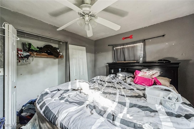 bedroom featuring a closet and a ceiling fan