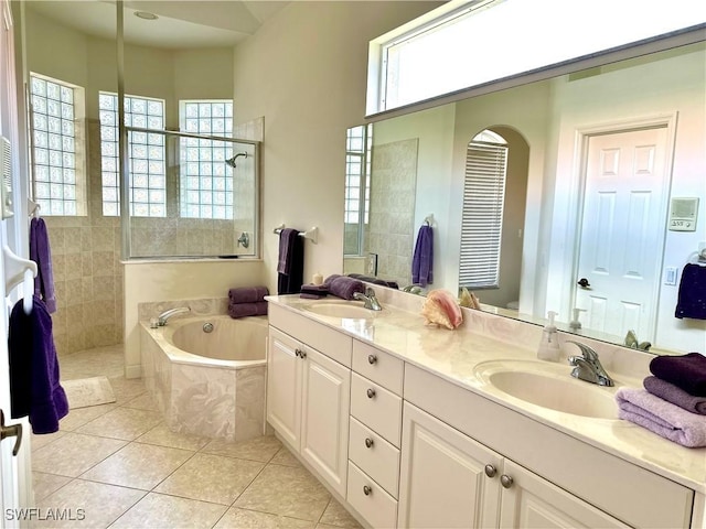 28171 L Burton Fletcher Ct, Bonita Springs, FL 34135 - bathroom featuring plenty of natural light, a bath, and double vanity