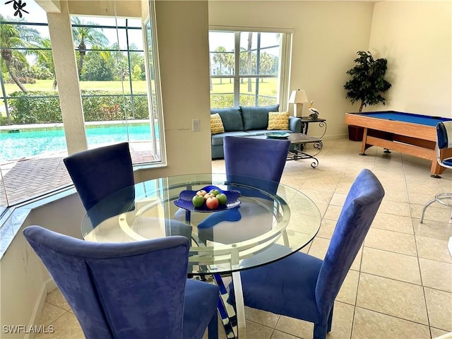 28171 L Burton Fletcher Ct, Bonita Springs, FL 34135 - dining space featuring healthy amount of natural light, tile patterned flooring, and billiards table