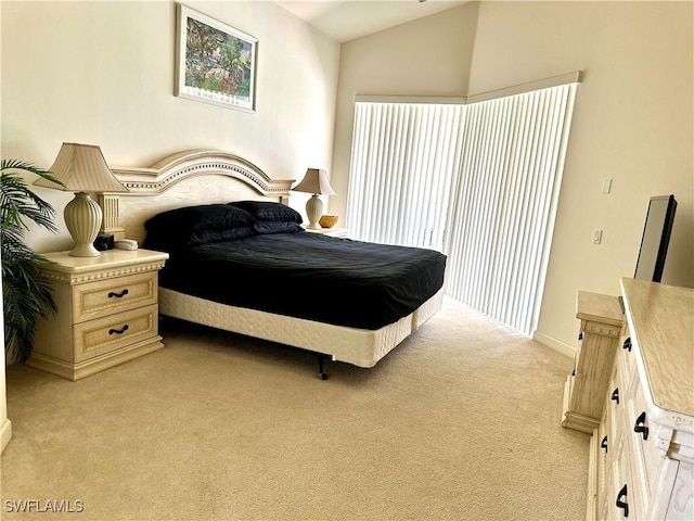 28171 L Burton Fletcher Ct, Bonita Springs, FL 34135 - bedroom featuring light colored carpet, lofted ceiling, and baseboards