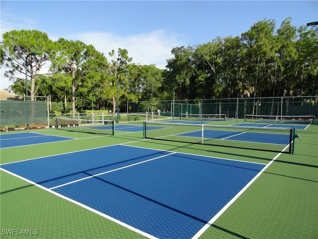 28171 L Burton Fletcher Ct, Bonita Springs, FL 34135 - view of tennis court featuring community basketball court and view of scattered trees