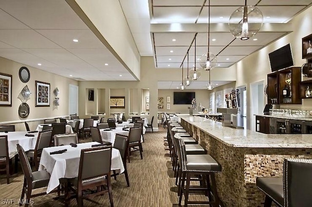 28171 L Burton Fletcher Ct, Bonita Springs, FL 34135 - dining space with a chandelier and recessed lighting