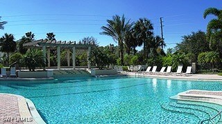 28171 L Burton Fletcher Ct, Bonita Springs, FL 34135 - community pool featuring a pergola
