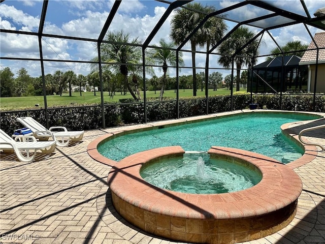 28171 L Burton Fletcher Ct, Bonita Springs, FL 34135 - view of pool with a pool with connected hot tub, a patio, and a lanai