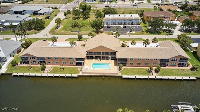 1124 SW 48th Ter Unit 208, Cape Coral, FL 33914 - aerial perspective of suburban area featuring a nearby body of water