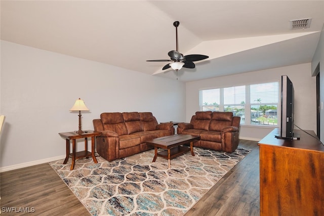 1124 SW 48th Ter Unit 208, Cape Coral, FL 33914 - living area with lofted ceiling, wood finished floors, ceiling fan, and baseboards
