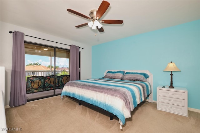 1124 SW 48th Ter Unit 208, Cape Coral, FL 33914 - carpeted bedroom with access to exterior, baseboards, and ceiling fan