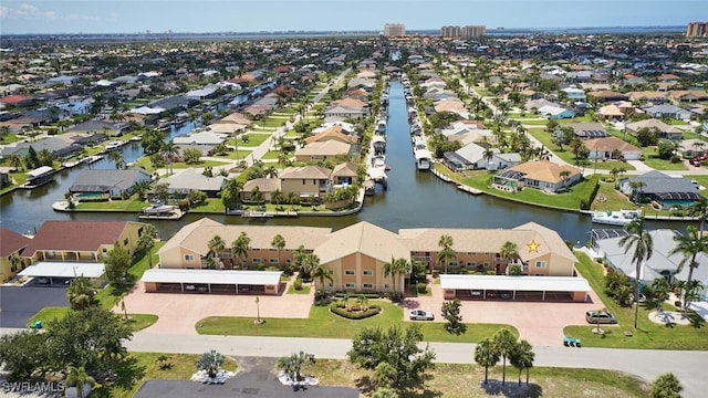 1124 SW 48th Ter Unit 208, Cape Coral, FL 33914 - aerial perspective of suburban area featuring a nearby body of water