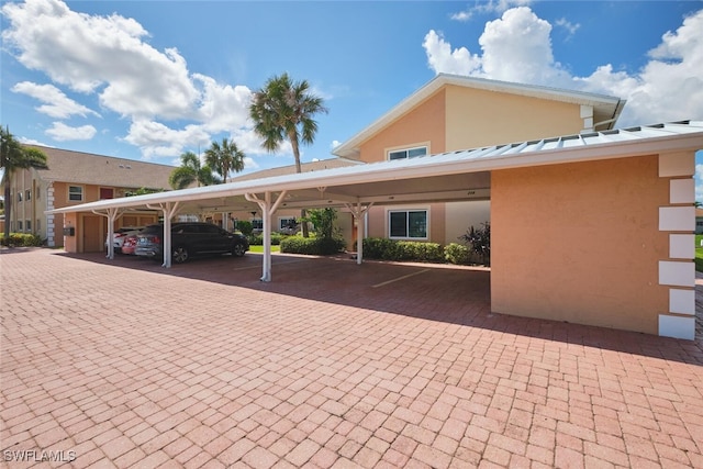 1124 SW 48th Ter Unit 208, Cape Coral, FL 33914 - view of covered parking lot