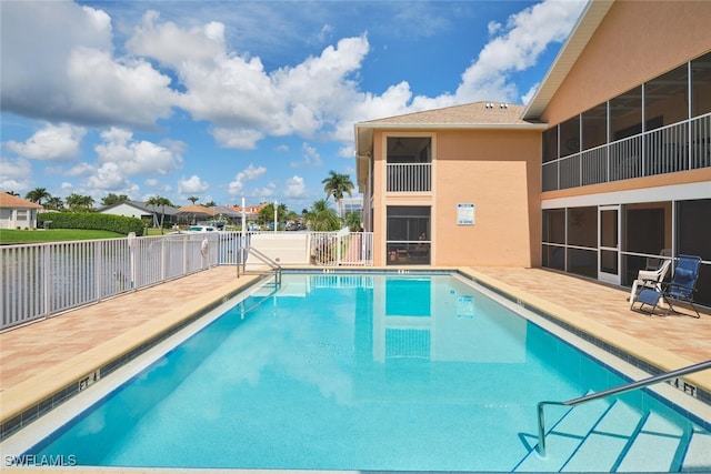 1124 SW 48th Ter Unit 208, Cape Coral, FL 33914 - community pool featuring a patio