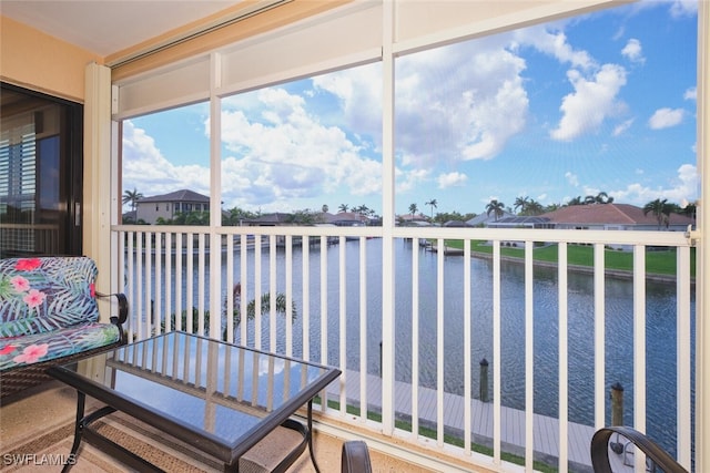 1124 SW 48th Ter Unit 208, Cape Coral, FL 33914 - sunroom / solarium featuring a water view and a residential view