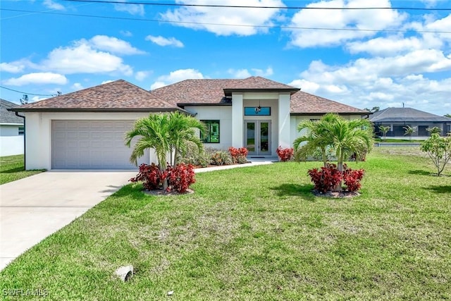 1409 SW 24th St, Cape Coral, FL 33991 - view of front of property featuring french doors, stucco siding, a garage, and driveway
