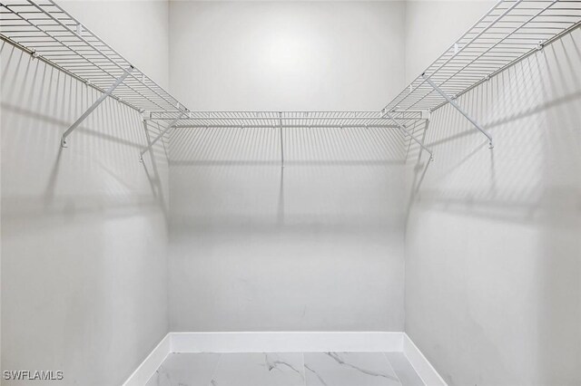 1409 SW 24th St, Cape Coral, FL 33991 - walk in closet with marble finish flooring