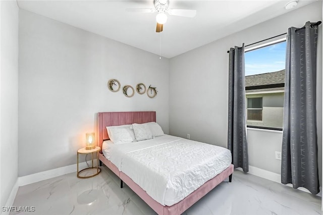 1409 SW 24th St, Cape Coral, FL 33991 - bedroom featuring marble finish flooring, baseboards, and a ceiling fan