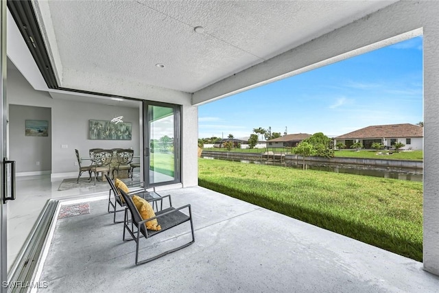 1409 SW 24th St, Cape Coral, FL 33991 - view of patio featuring a water view