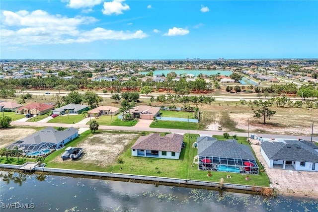 1409 SW 24th St, Cape Coral, FL 33991 - aerial view of residential area with a large body of water