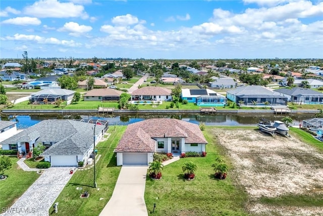 1409 SW 24th St, Cape Coral, FL 33991 - aerial view of residential area featuring a nearby body of water