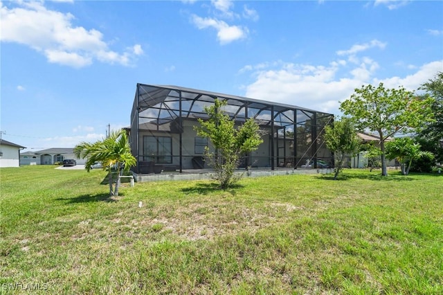 3410 NW 17th Ln, Cape Coral, FL 33993 - back of property featuring a lawn
