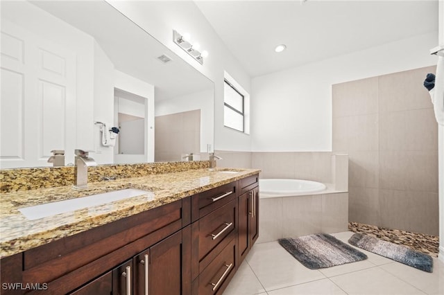 3410 NW 17th Ln, Cape Coral, FL 33993 - bathroom with a bath, double vanity, tile patterned floors, and tiled shower