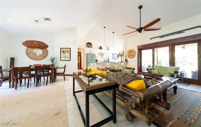 2535 River Reach Dr, Naples, FL 34104 - living area featuring ceiling fan, high vaulted ceiling, french doors, light tile patterned floors, and recessed lighting