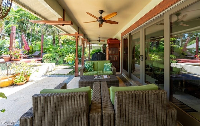 2535 River Reach Dr, Naples, FL 34104 - view of patio with a ceiling fan and an outdoor hangout area