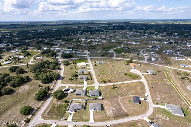 1049 Solar Ct, Labelle, FL 33935 - aerial view of property and surrounding area with nearby suburban area