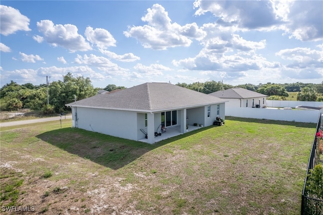1049 Solar Ct, Labelle, FL 33935 - rear view of property with a patio and stucco siding