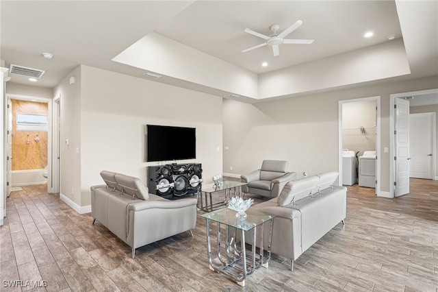 1049 Solar Ct, Labelle, FL 33935 - living area with independent washer and dryer, ceiling fan, baseboards, light wood-style flooring, and recessed lighting
