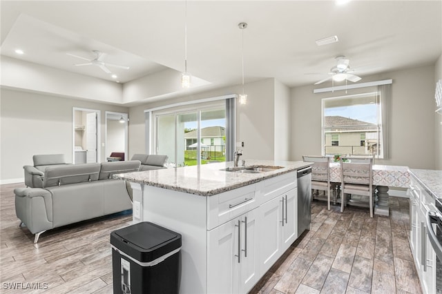 1049 Solar Ct, Labelle, FL 33935 - kitchen featuring a sink, a ceiling fan, dishwasher, plenty of natural light, and recessed lighting