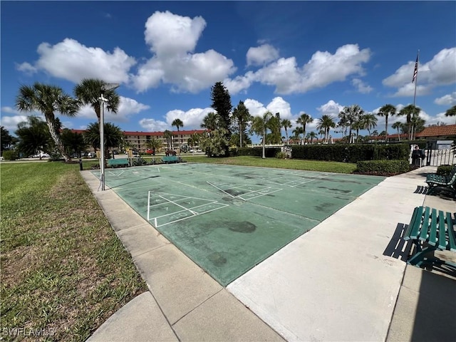 4186 27th Ct SW Unit 105, Naples, FL 34116 - surrounding community with shuffleboard and a lawn
