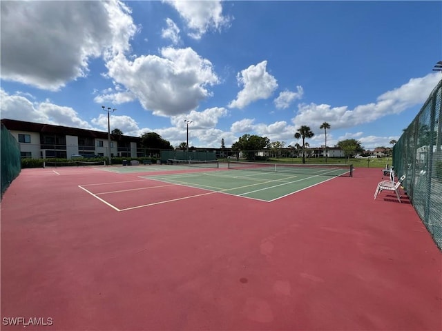 4186 27th Ct SW Unit 105, Naples, FL 34116 - view of tennis court with community basketball court