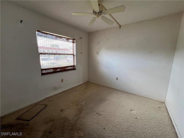4186 27th Ct SW Unit 105, Naples, FL 34116 - unfurnished room featuring carpet floors, ceiling fan, and baseboards