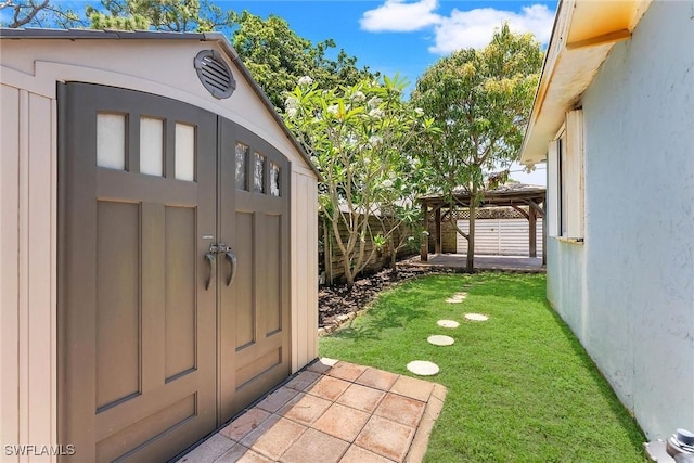 7709 1st Ter, Lake Worth, FL 33463 - doorway to property with stucco siding and a patio area