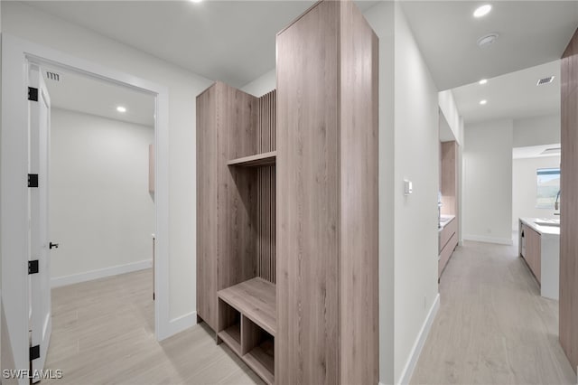 419 NW 7th Ave, Cape Coral, FL 33993 - mudroom with light wood-style flooring, recessed lighting, and baseboards