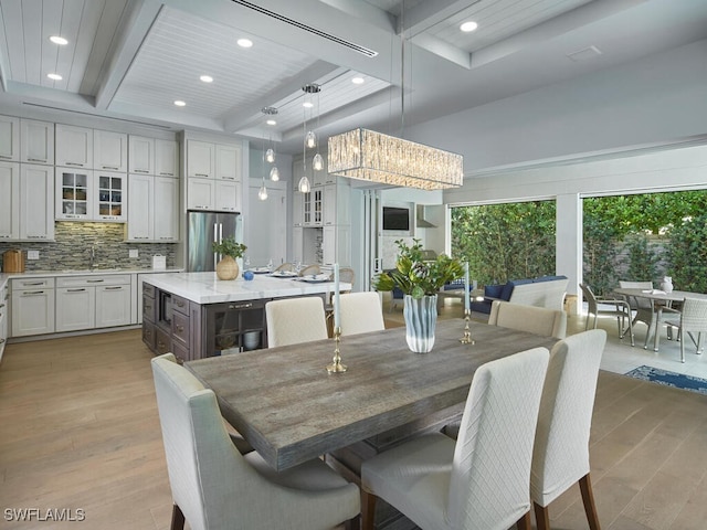 242 2nd Ave S, Naples, FL 34102 - dining room featuring wood finished floors, recessed lighting, and beam ceiling