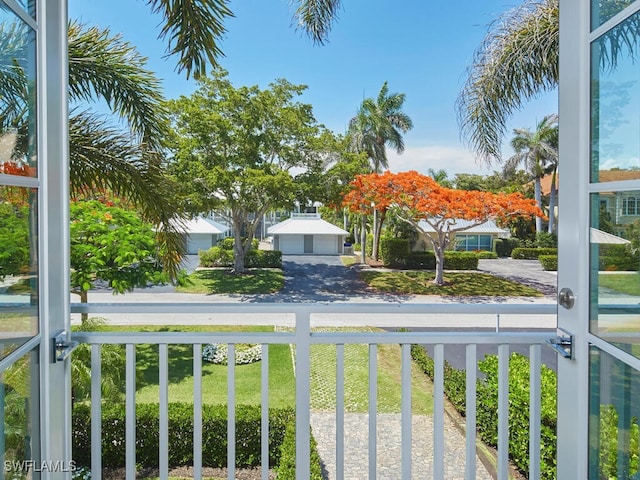 242 2nd Ave S, Naples, FL 34102 - view of yard featuring a balcony