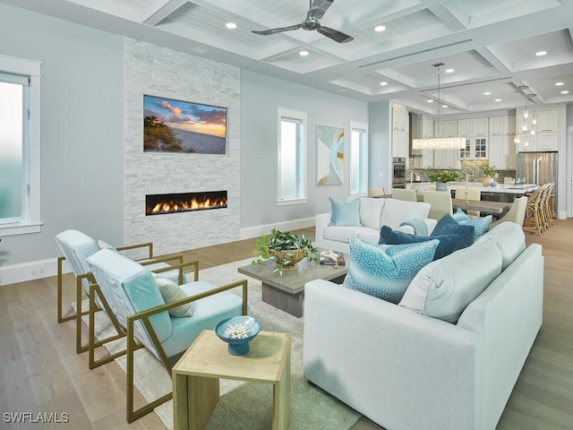 242 2nd Ave S, Naples, FL 34102 - living room with coffered ceiling, baseboards, a ceiling fan, light wood-type flooring, and recessed lighting