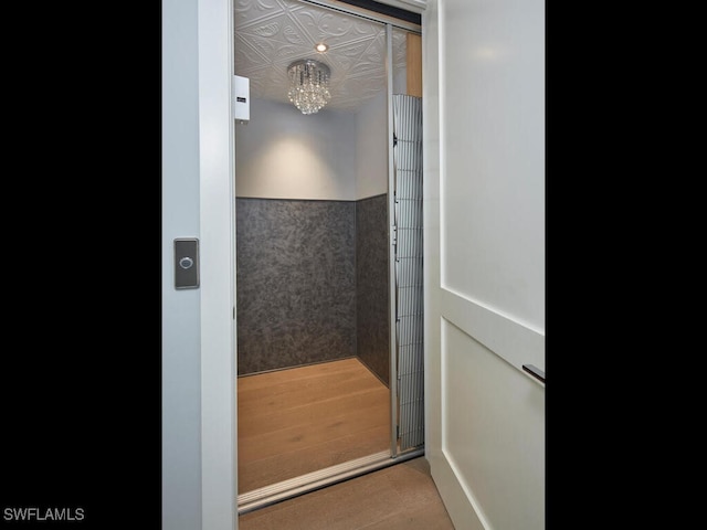 242 2nd Ave S, Naples, FL 34102 - elevator with a chandelier