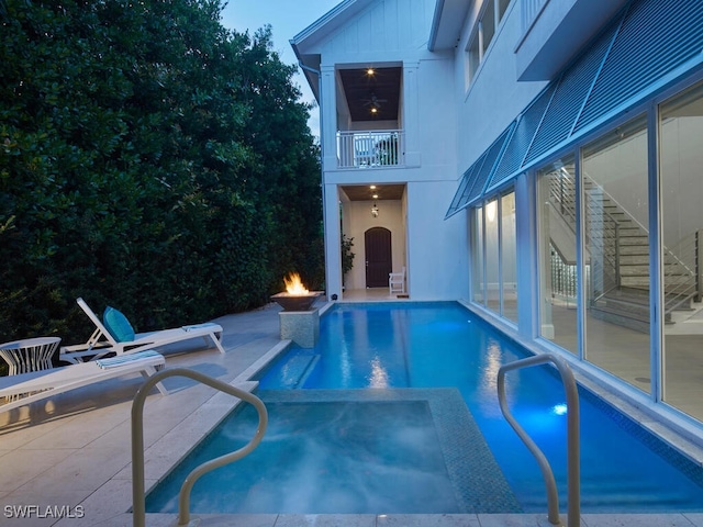 242 2nd Ave S, Naples, FL 34102 - view of swimming pool featuring a patio and a pool with connected hot tub