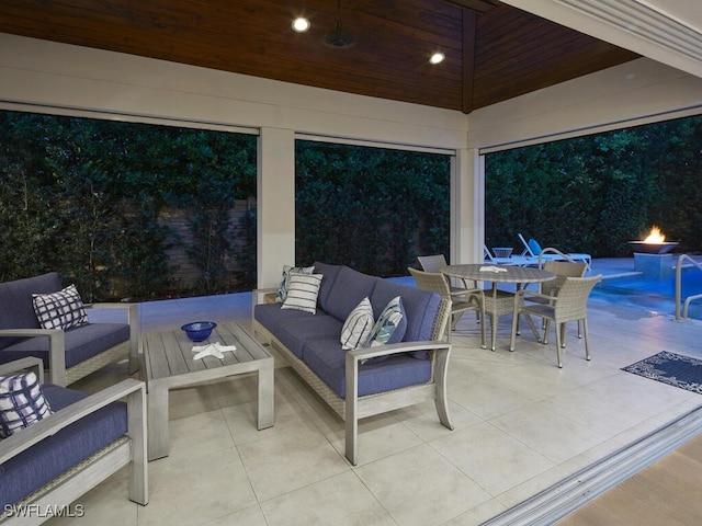 242 2nd Ave S, Naples, FL 34102 - view of patio / terrace featuring outdoor lounge area, outdoor dining space, and an outdoor pool